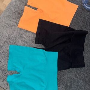 Women's Orange, Black, and Teal biker shorts